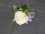Stylish white rose buttonhole